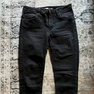 Mavi Jeans Co | Skinny black jeans with shredded bottoms
